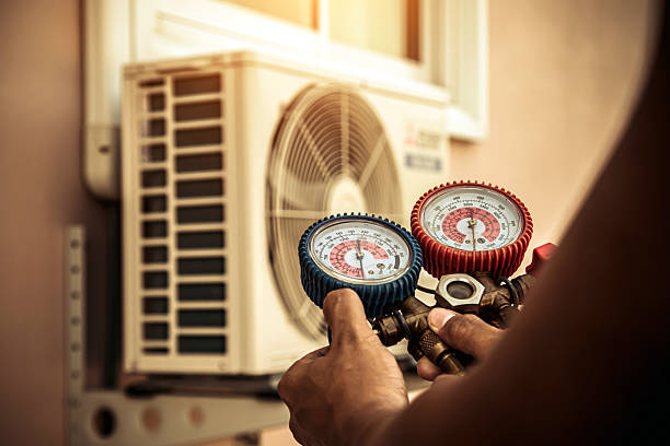 Professional Heat Pump Repair technician working in Weston, TX